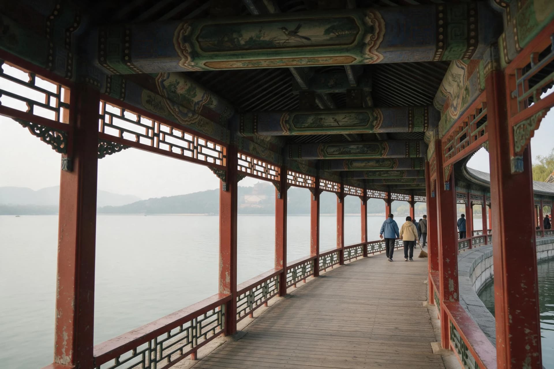 Long Corridor walkway at the Summer Palace in Beijing, painted beams curving above Kunming Lake
