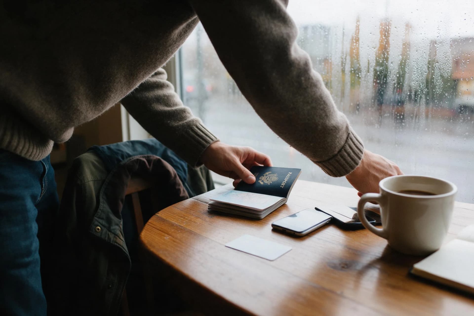 Traveler adding a foreign Visa card to Alipay at home before flying to China, pre-flight payment setup in 2026
